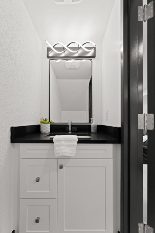 1st floor half bathroom offers modern sophistication along with convenience.