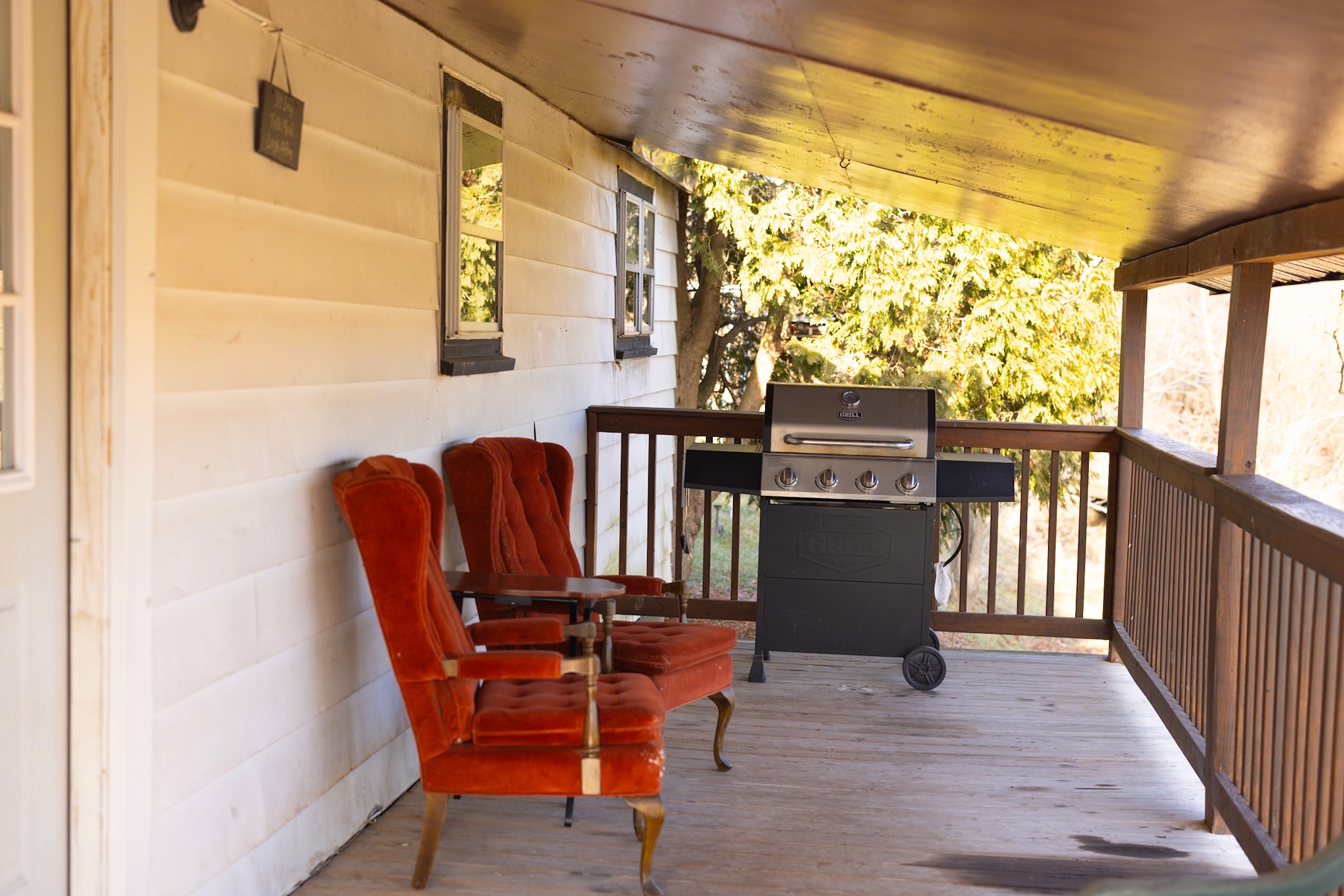 Covered back porch, overlooking fields and mountains
