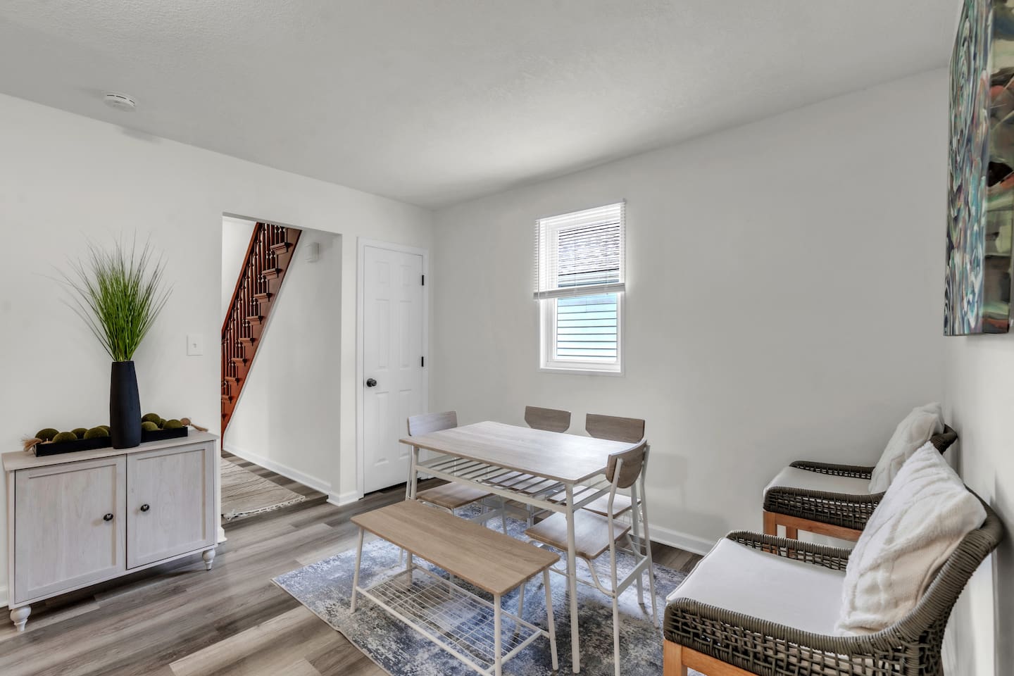 Gather around the dining table in this beautifully designed space, perfect for shared meals and meaningful conversations.