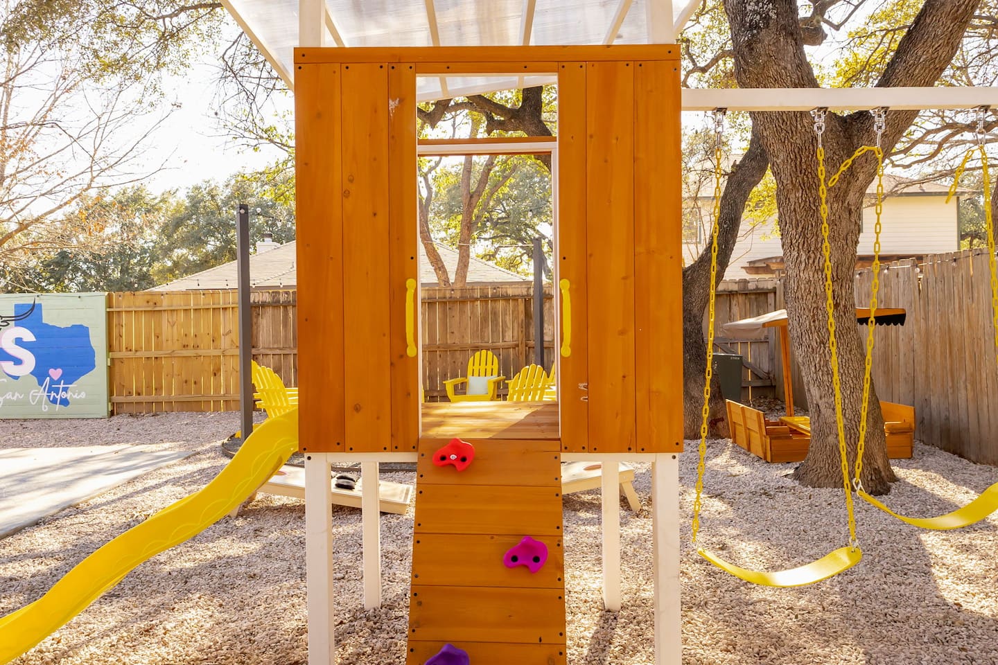 Let the little ones run wild! Our backyard playset features swings, a slide, and a mini climbing wall—endless fun under the Texas sun. 