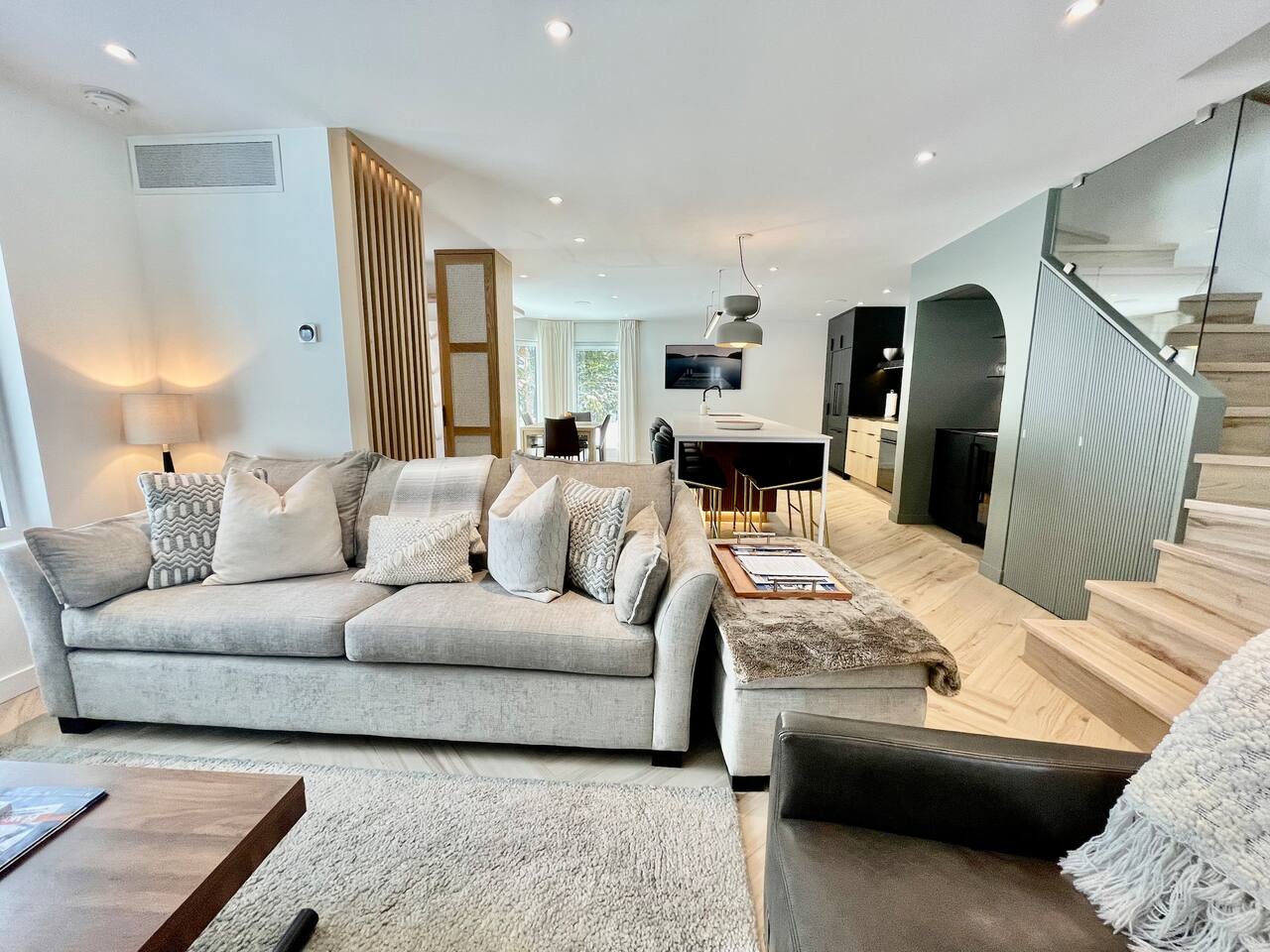 The main floor is a brilliantly designed transitional space that effortlessly flows from quick grab & go breakfast station to gourmet sit down dinner to group gatherings, dance party or movie night & chilling out. 