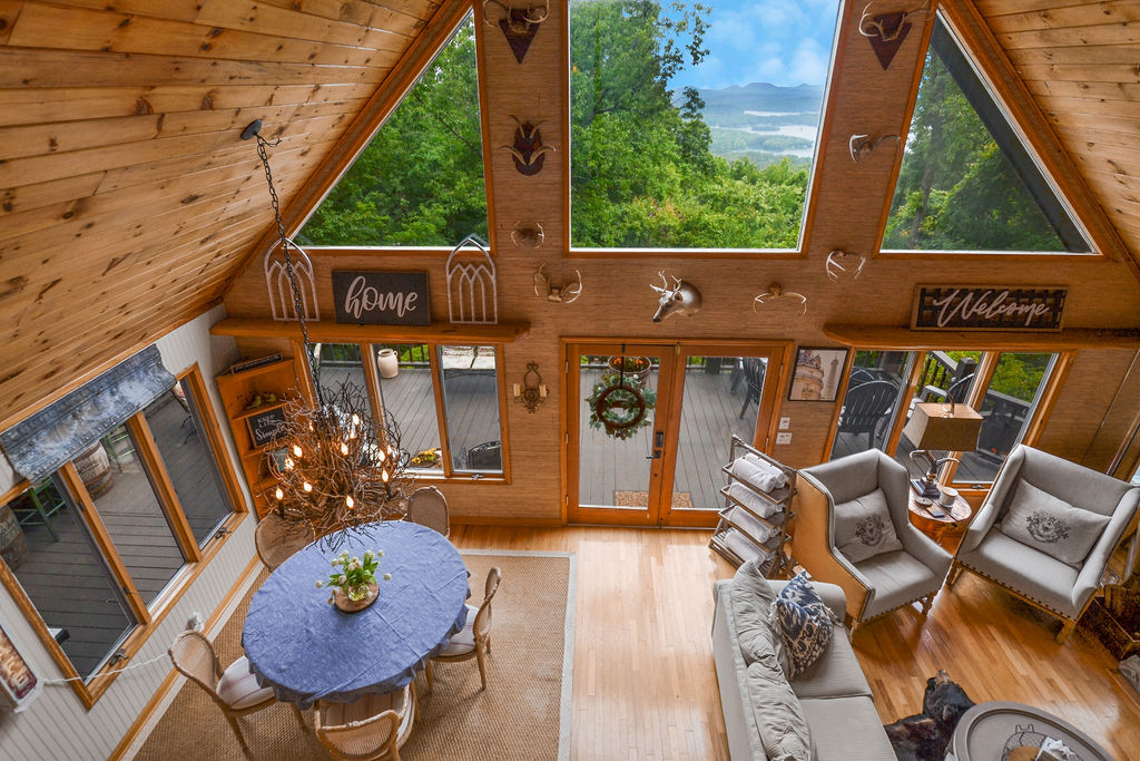 With large windows in this Italian Chalet you can see Mountains and lake Blue Ridge Anywhere