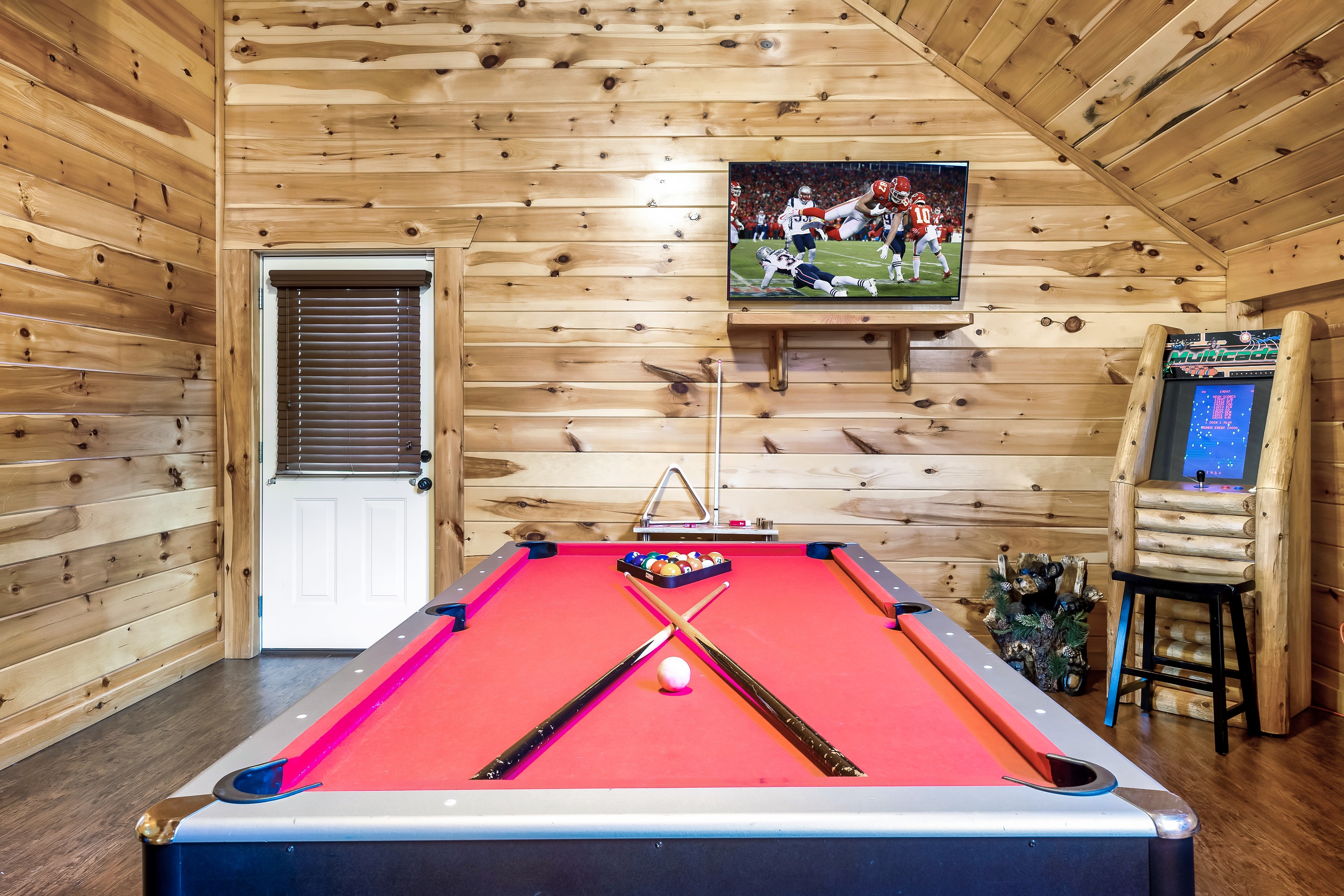 Endless fun awaits in the game room, where the pool table sets the stage for laughter, friendly competition, and unforgettable memories.