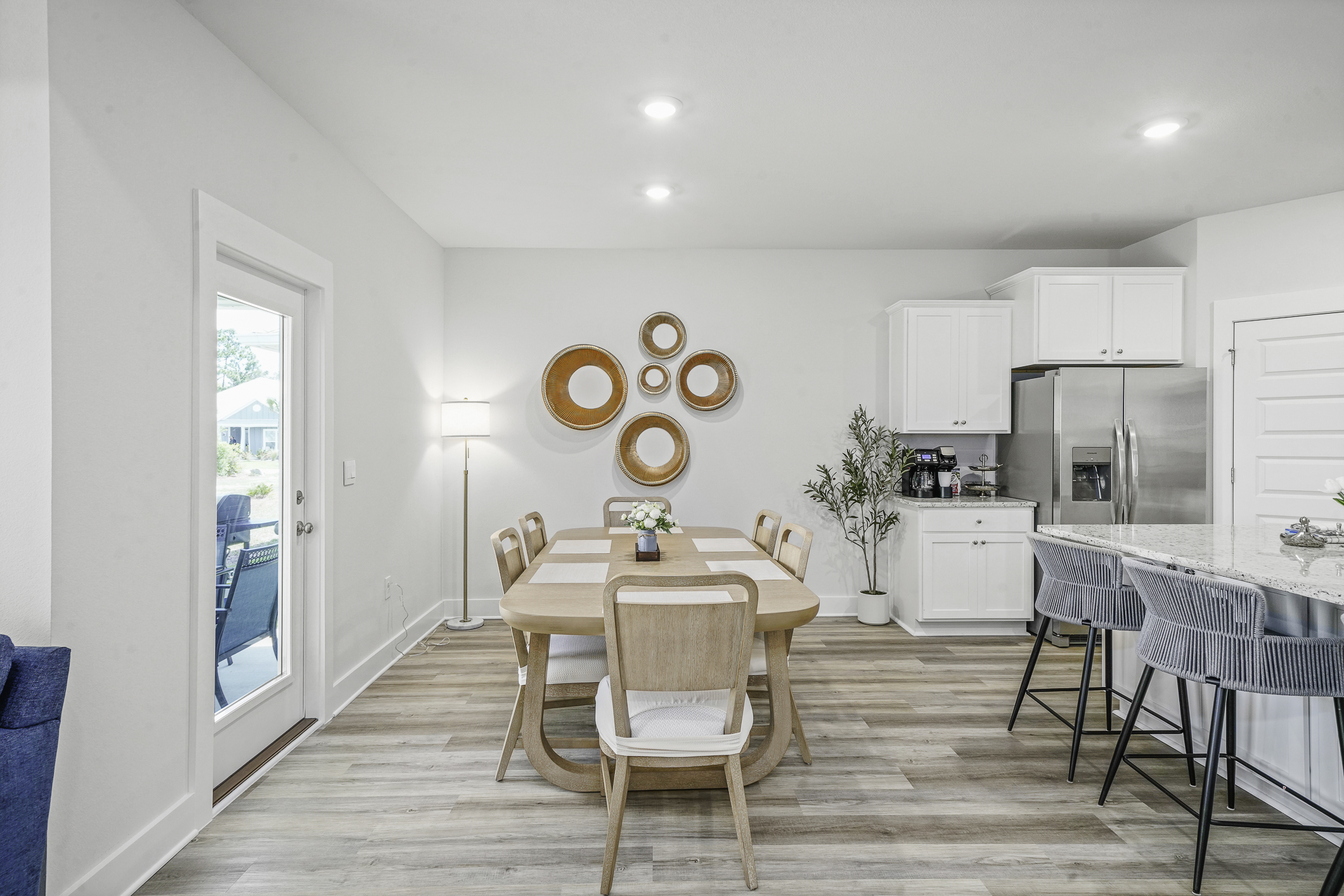 Bright open-concept dining space perfect for family meals seating for up to 9 guests