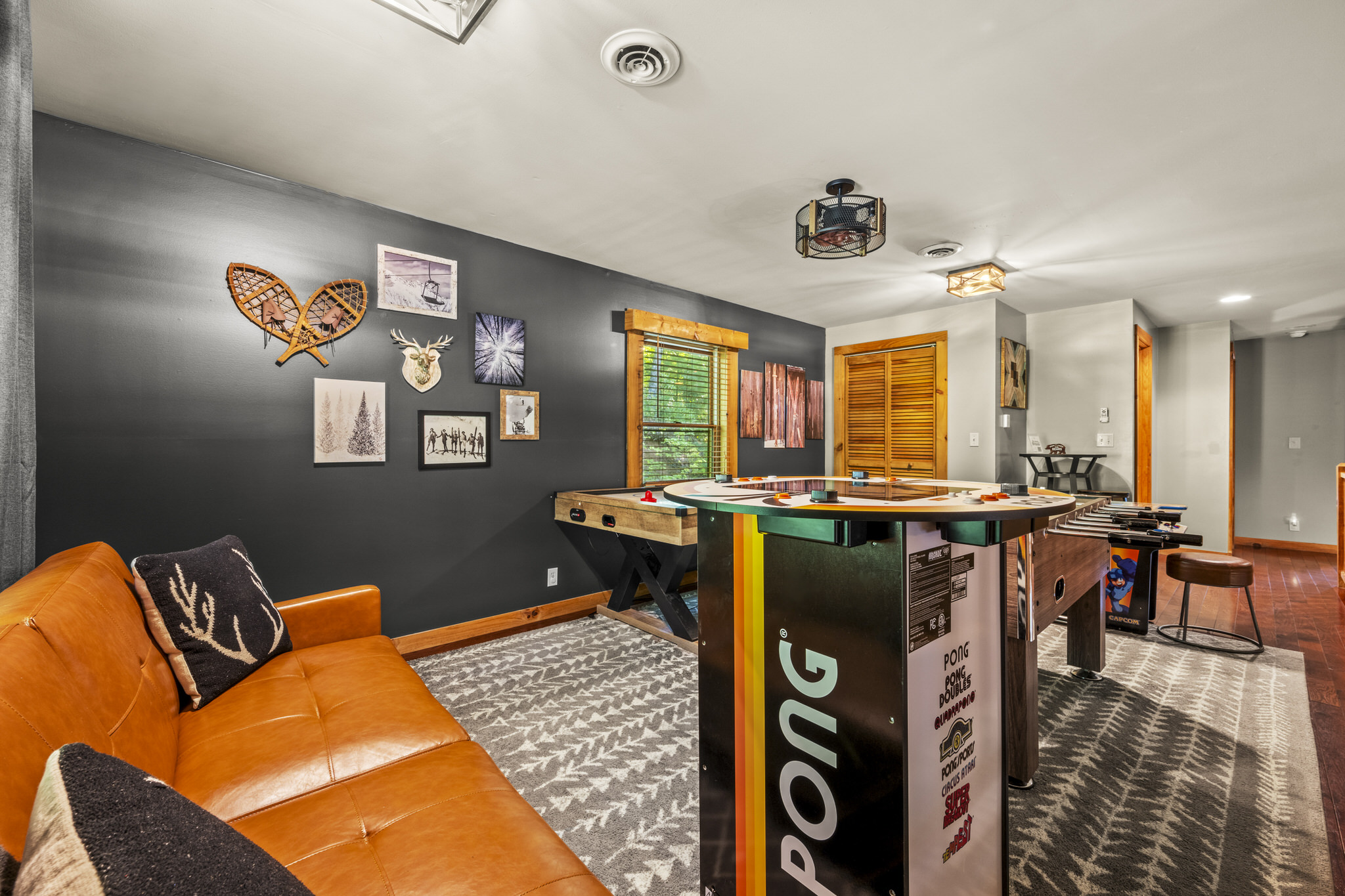 Get ready for some fun in this game loft. Convertible sofa for extra sleeping space.