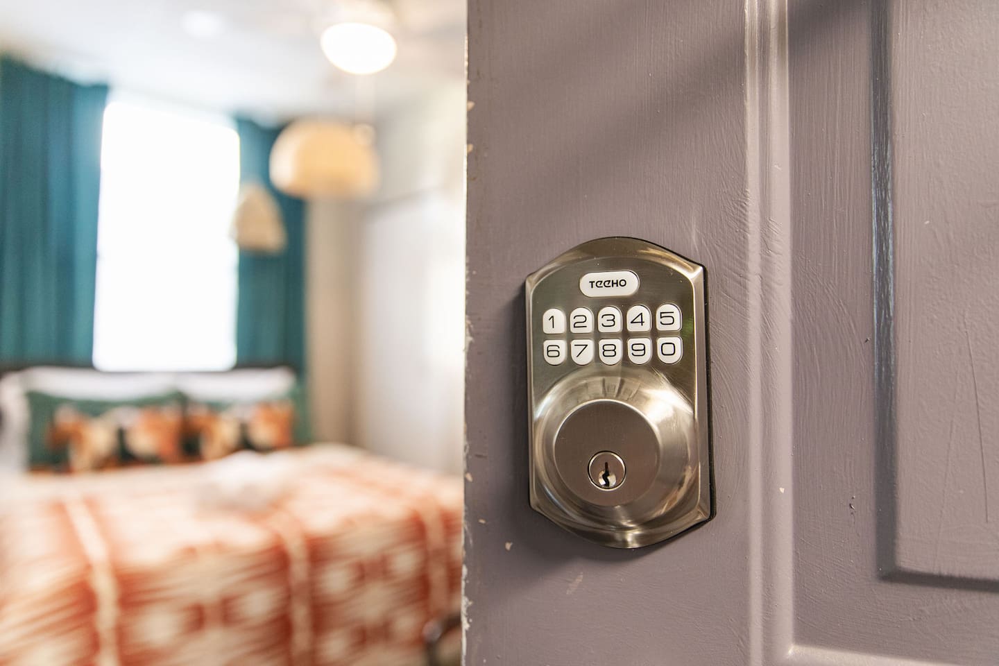 Front door with a secure keypad entry, providing easy and contactless access to the home during your stay.