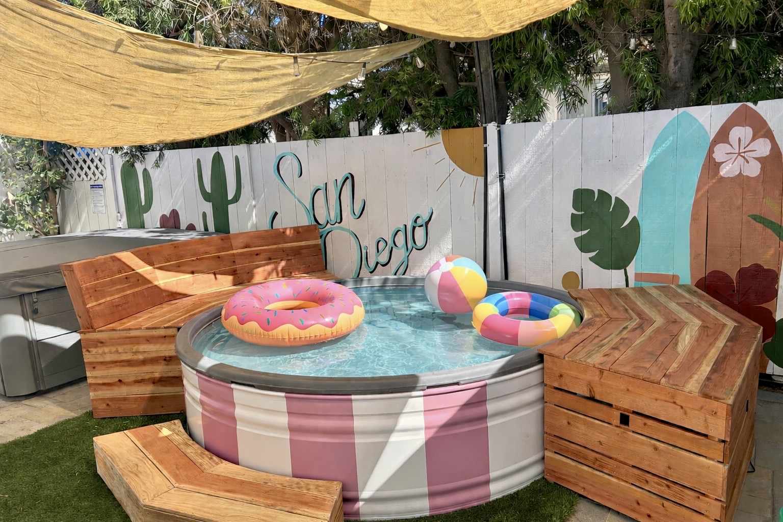 Introducing our newest backyard feature: a tank-style plunge pool, perfect for cooling off on sunny San Diego days! Please note: floaties pictured are for styling only and not included with the stay.