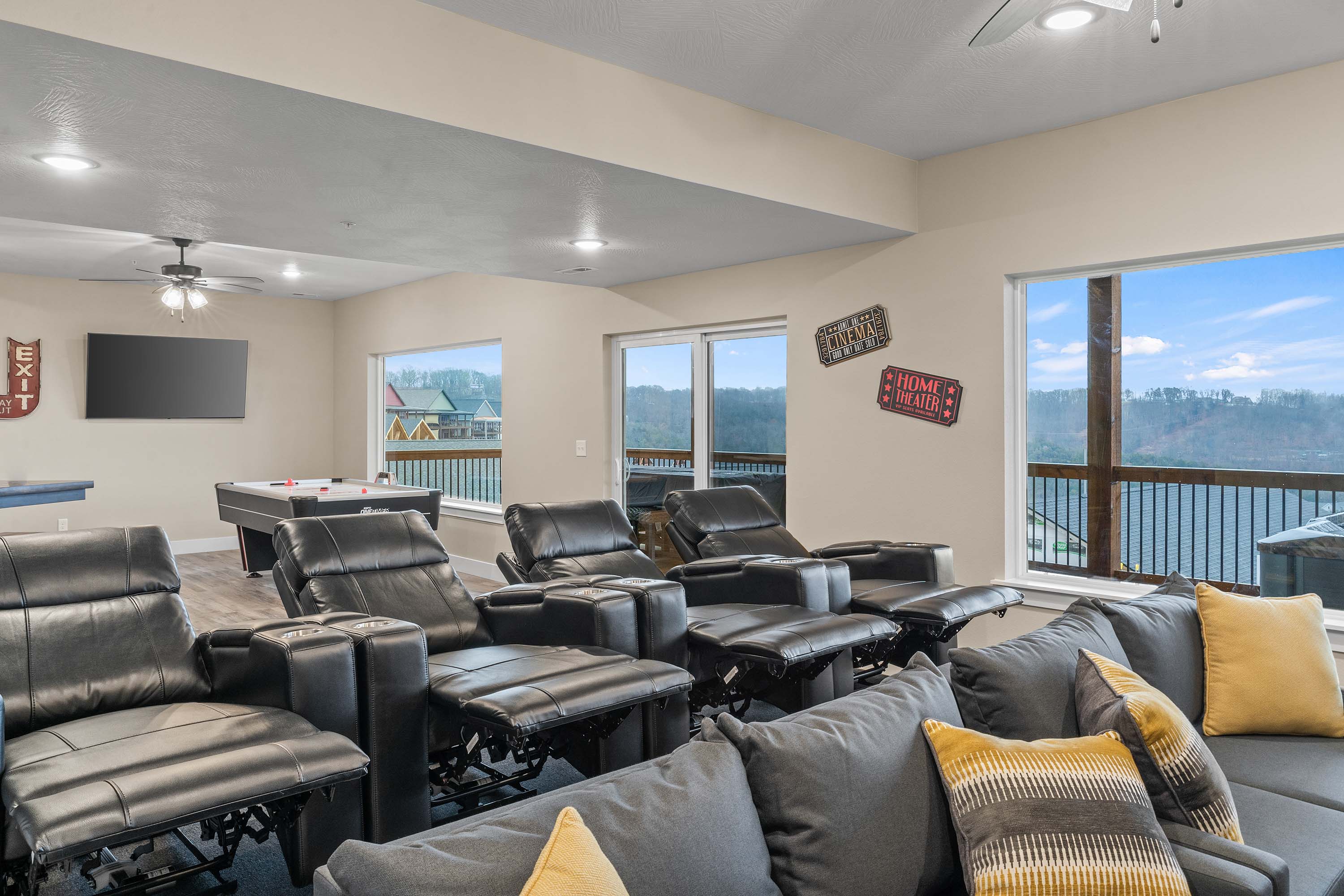 Media Room and Rec Room on lower level. Sliding glass door for access onto the lower deck.