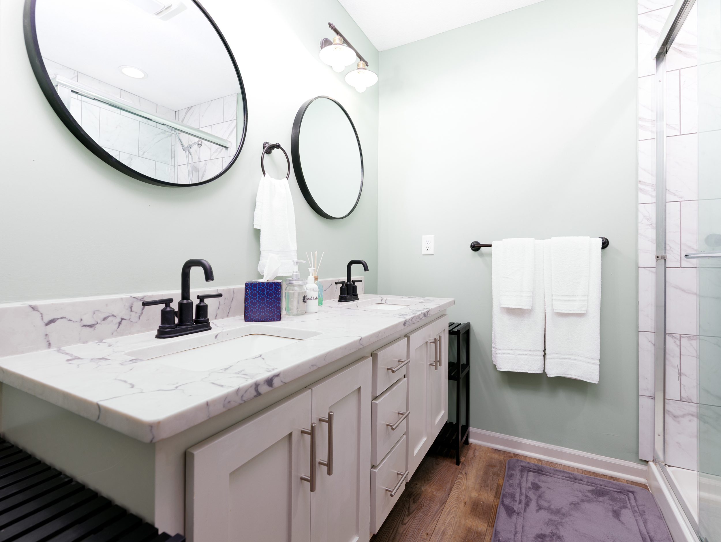 Modern ensuite bath exclusively serving the primary bedroom for added privacy and convenience.