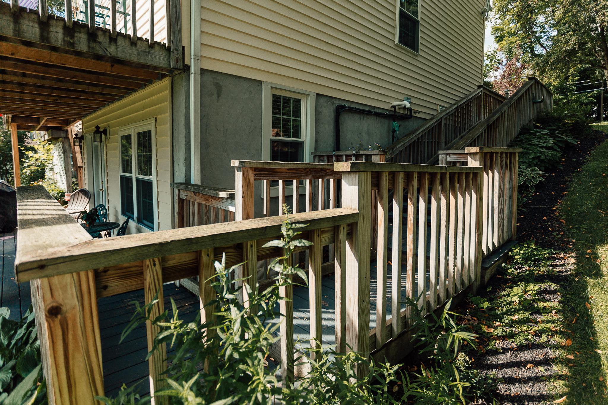 Stairs leading to the driveway from the studio.