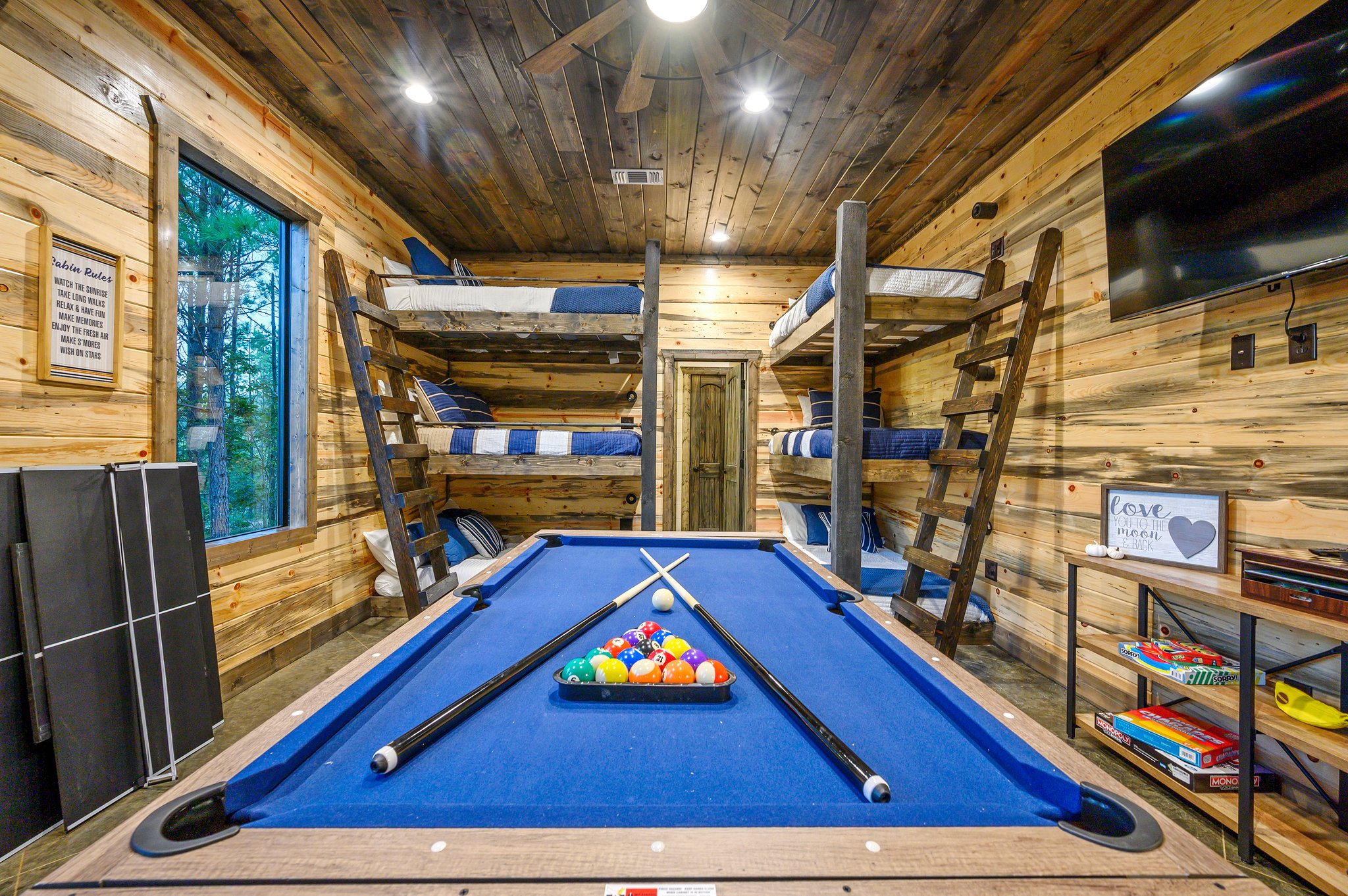 Stunning bunk room with action-filled games and 2 sets of bunk beds