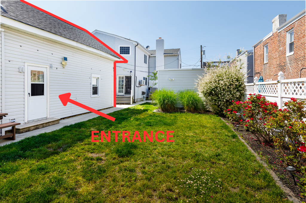 Enter through the rear of the property