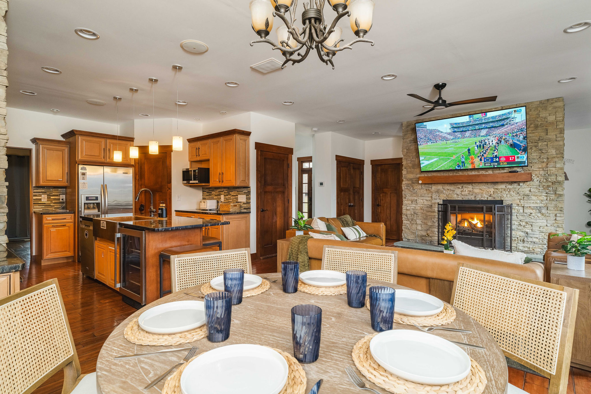 Chef-ready kitchen and large dining area keep everyone connected — perfect for shared meals, celebrations, and game-day spreads.