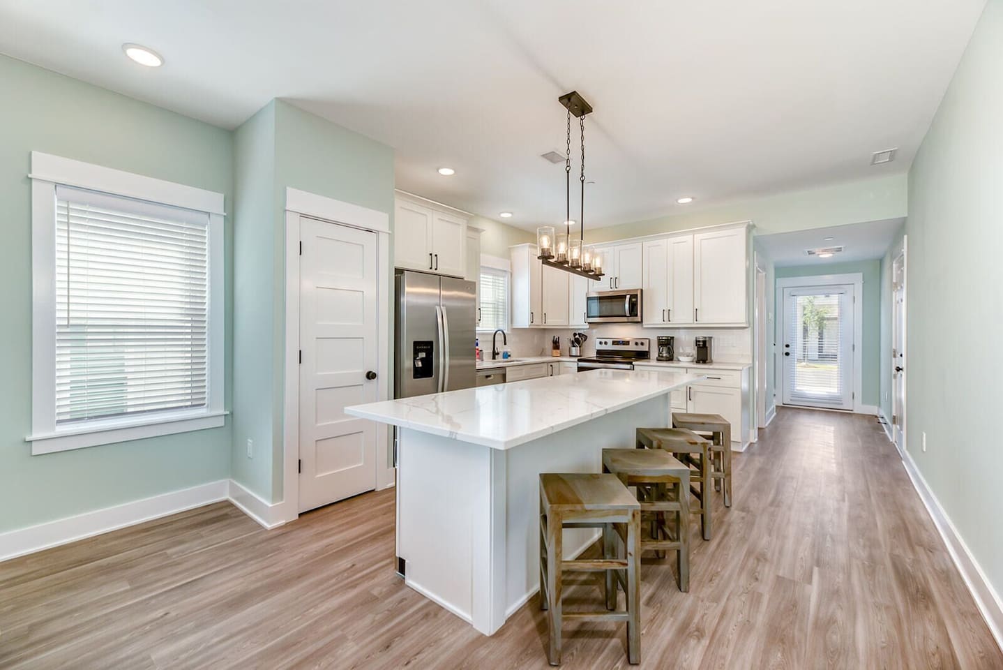 Open and airy kitchen space perfect for cooking, gathering, and making vacation memories.