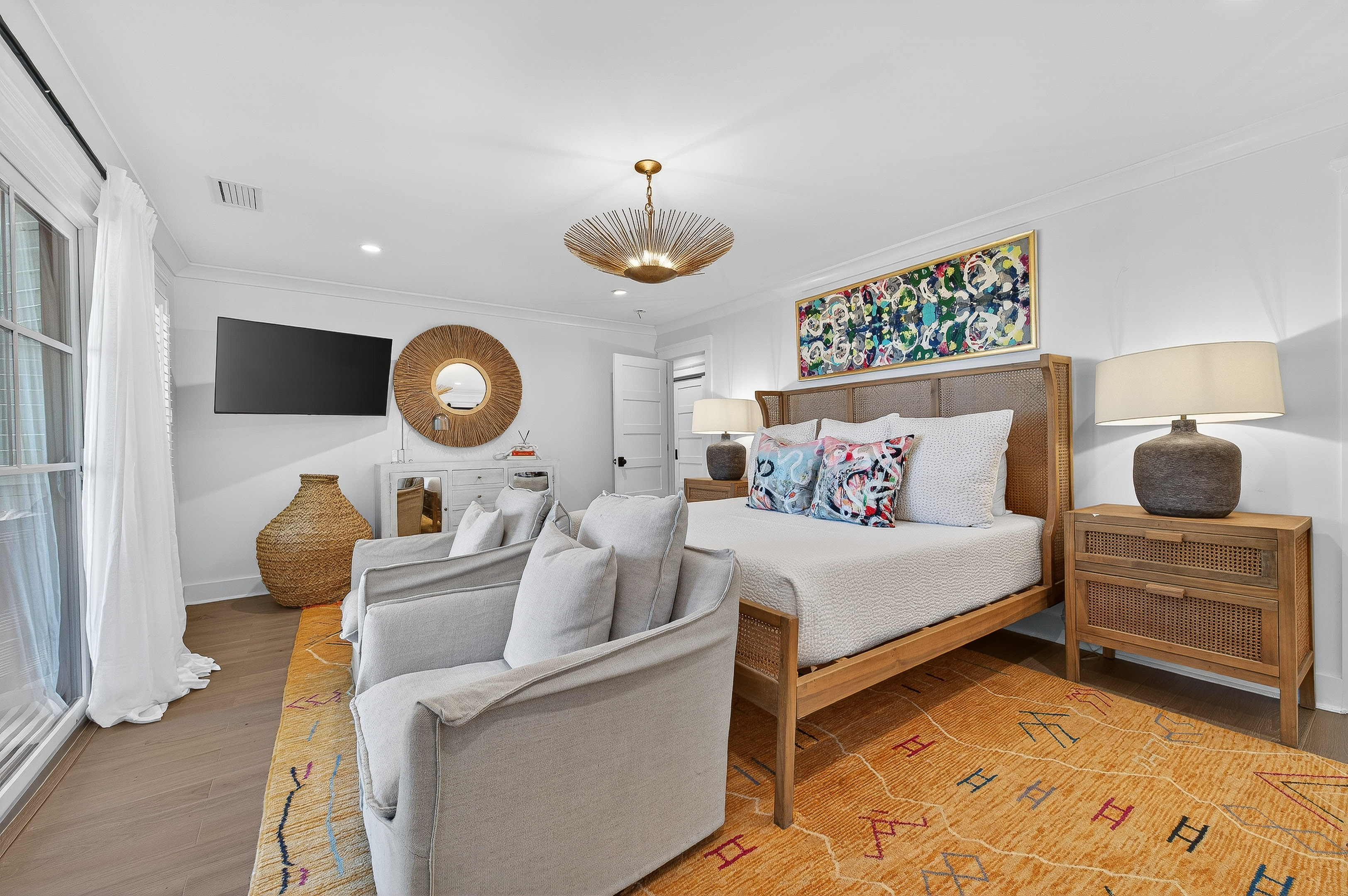 Spacious primary suite with soft layers and a relaxed feel