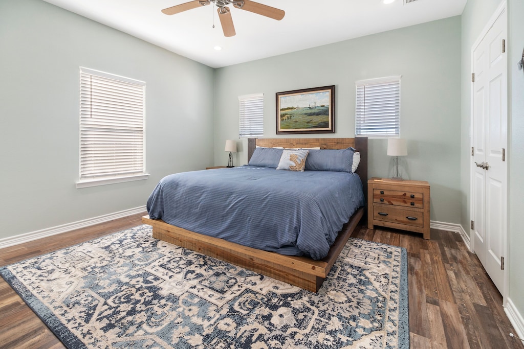 Master bedroom with king bed and en suite bathroom.