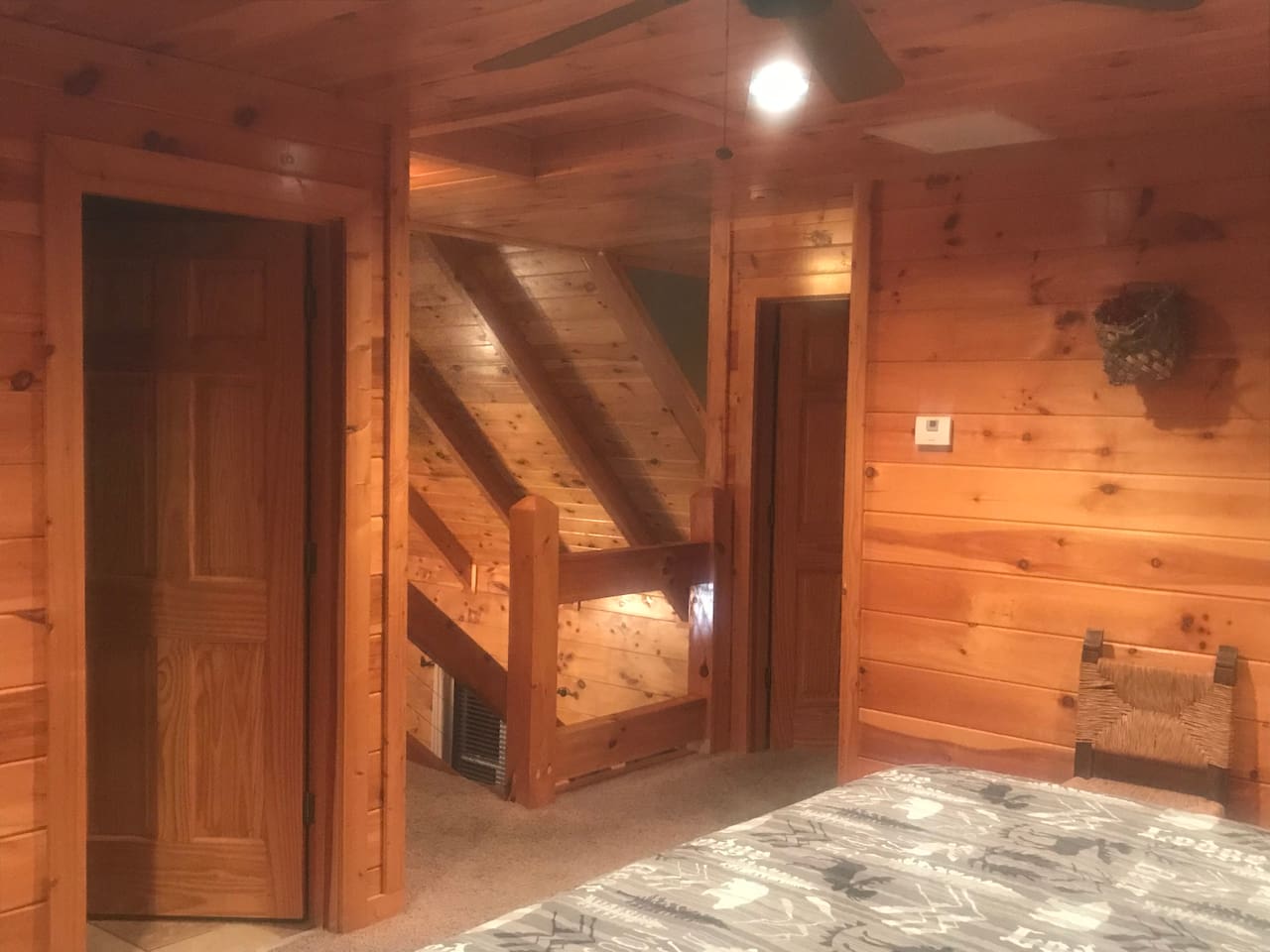 Loft, bedroom open over living room please note there is no doorno door