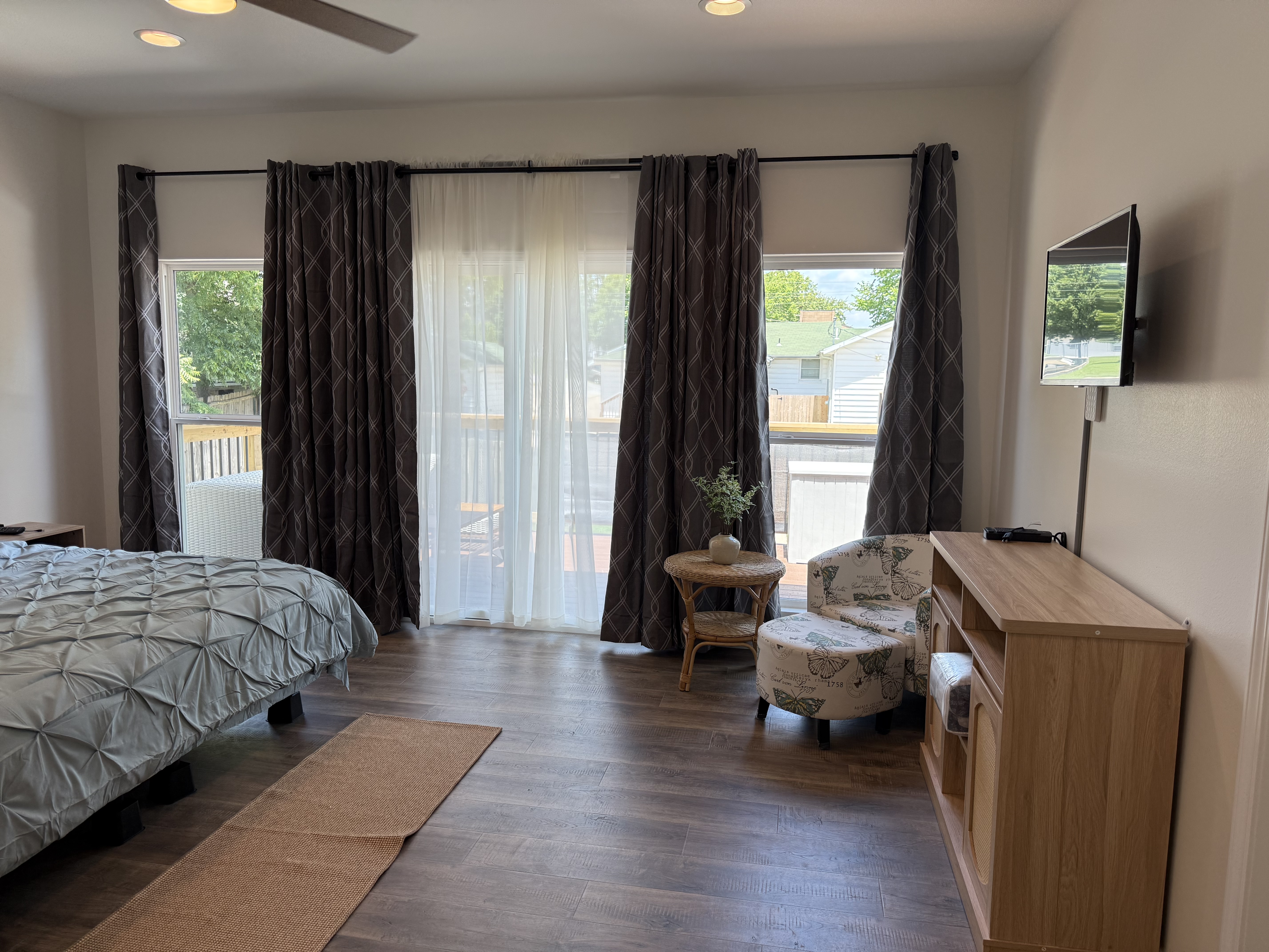 Master Bedroom with huge windows overlooking large inviting deck space