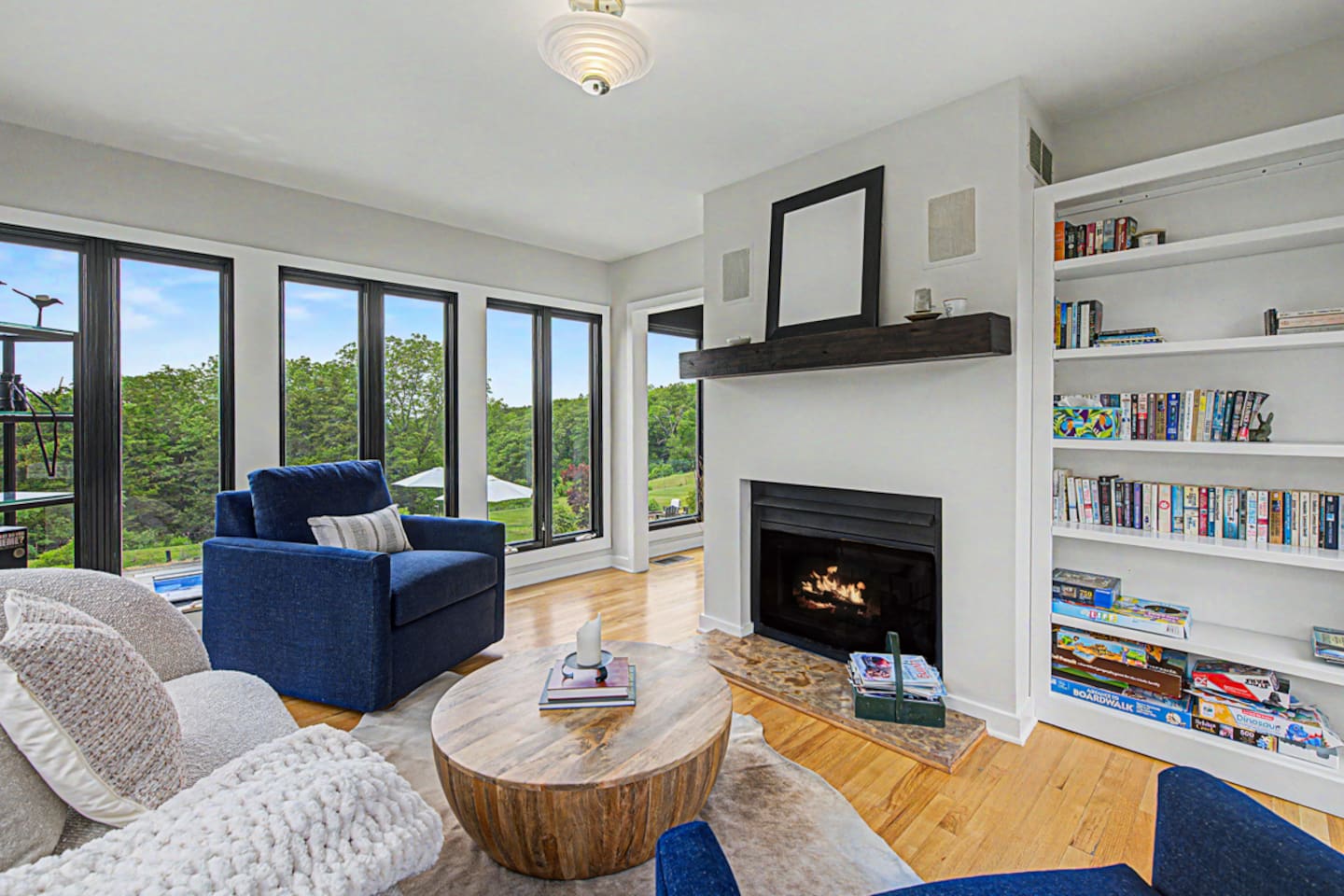 Light the fire and watch the weather move across the hills. The shelf is stocked for slow afternoons.
