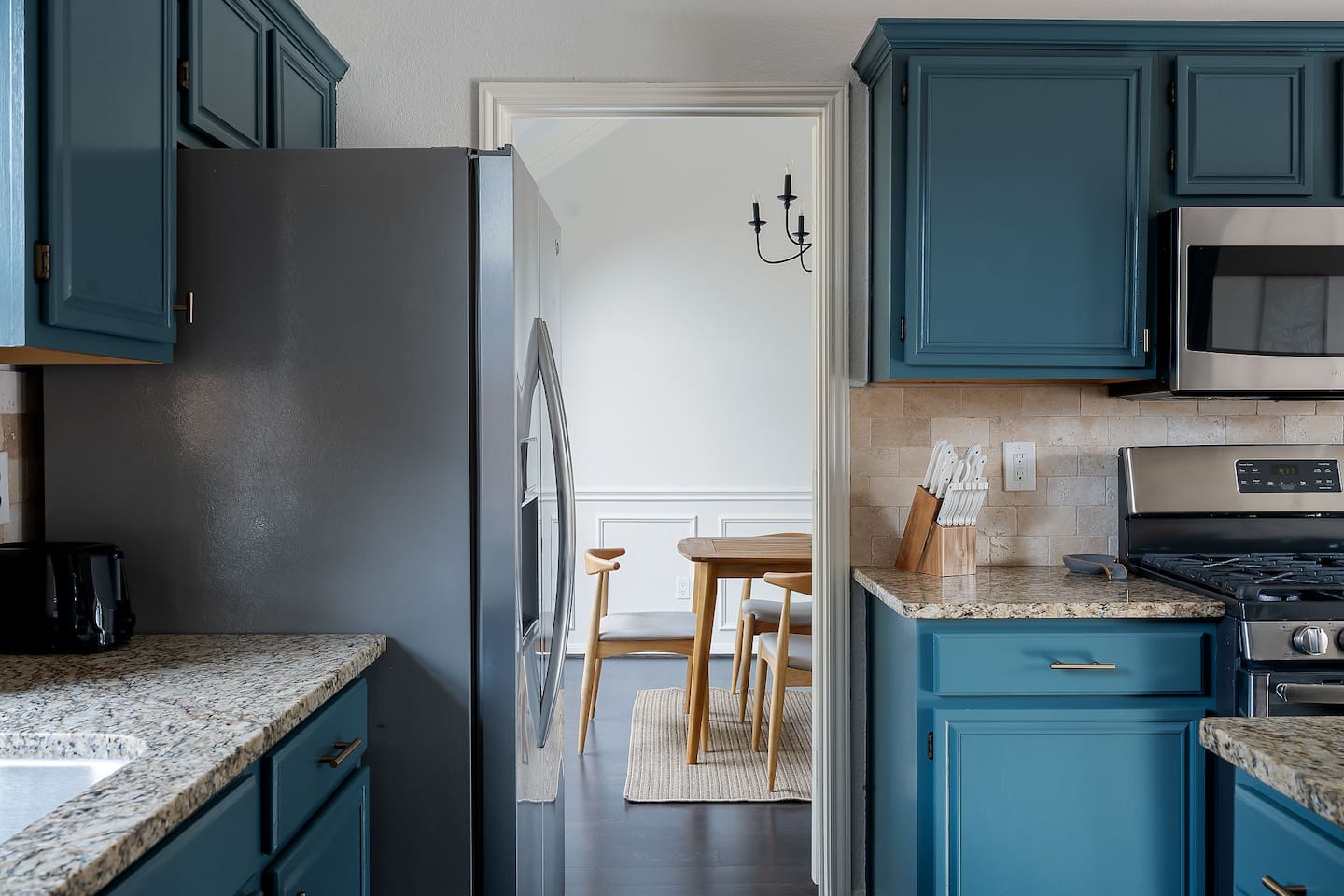 Enjoy the epitome of modern living with our fully equipped kitchen seamlessly blending with a stylish dining area, where the aroma of delicious meals mingles with the warmth of shared moments.