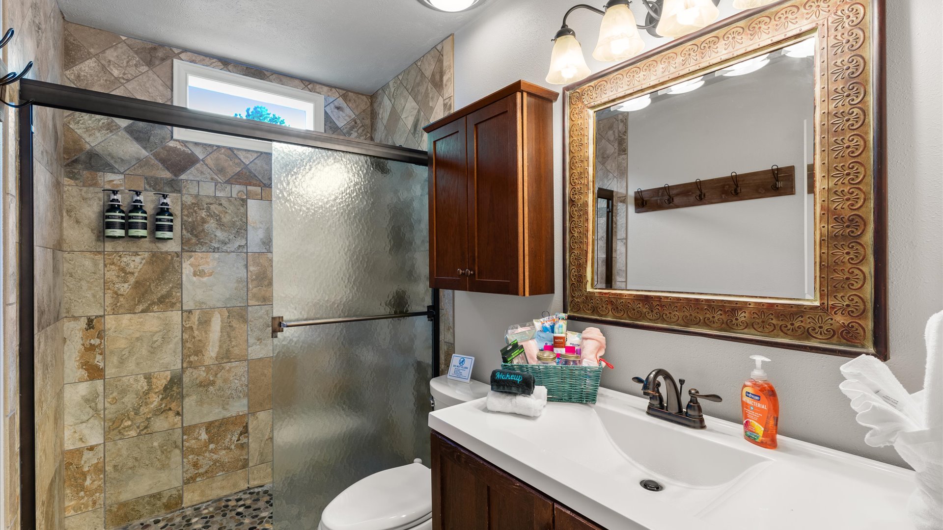 The hallway bathroom, located directly across from the trundle bedroom, is perfectly placed for the kids to use without disturbing anyone else in the house.