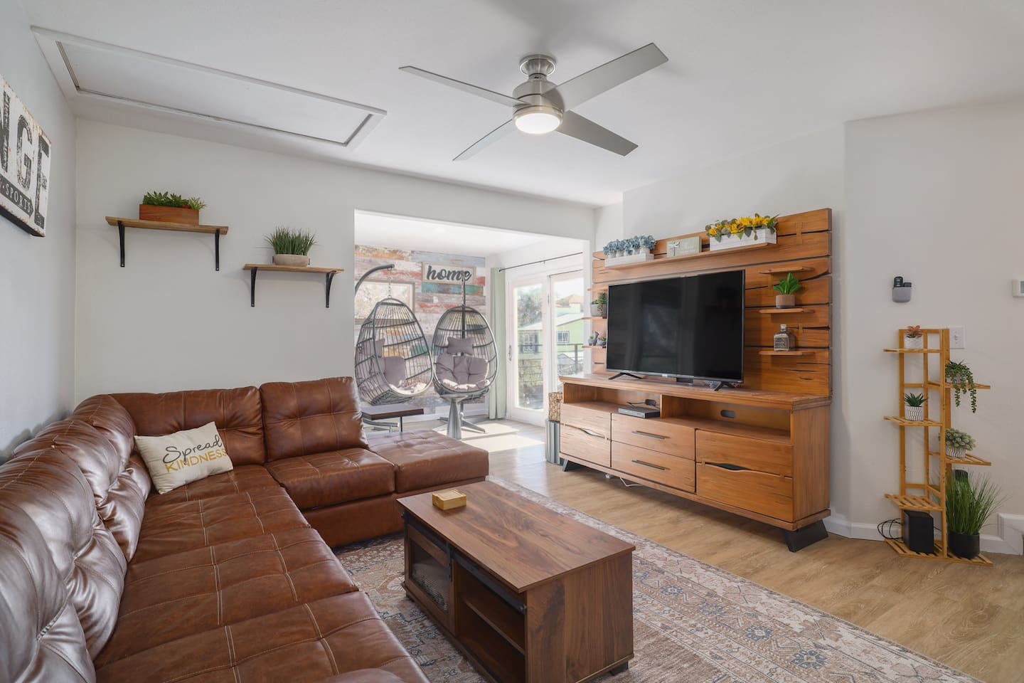 Sink into the oversized leather sectional, stream your favorite movie, and soak in the warm, inviting atmosphere. Just beyond, the hanging chairs offer the perfect spot for a quiet morning coffee or sunset unwind.