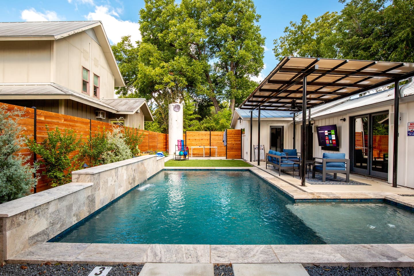 Lush turf area ideal for yoga reading or enjoying the sunshine surrounded by privacy fencing.