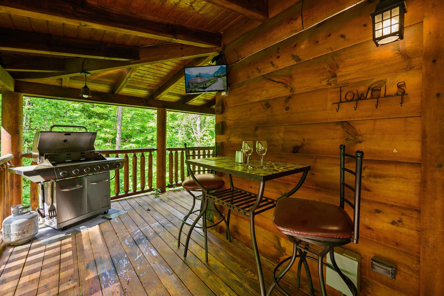 Steaks on grill, sports on TV, drinks in hand.  Life is good!