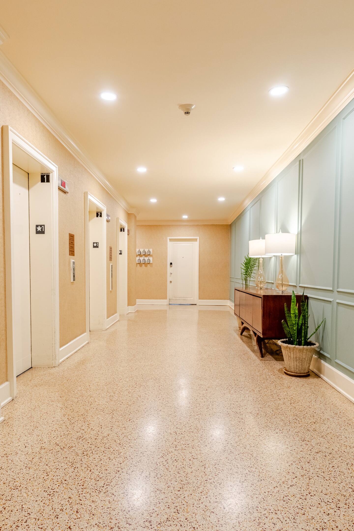 A welcoming common area with convenient elevator access for easy entry and mobility.