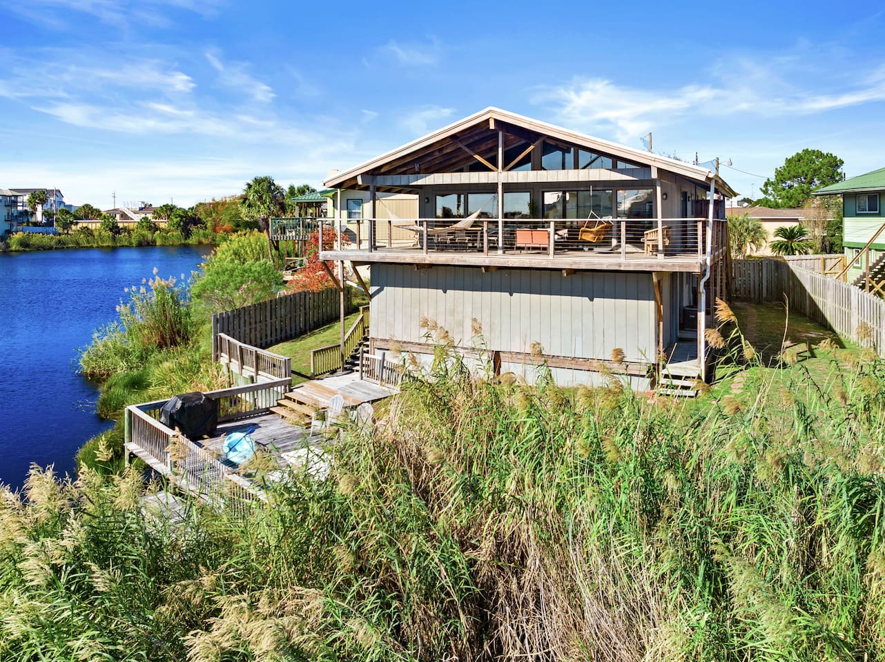 The deck and side yards are fully fenced.