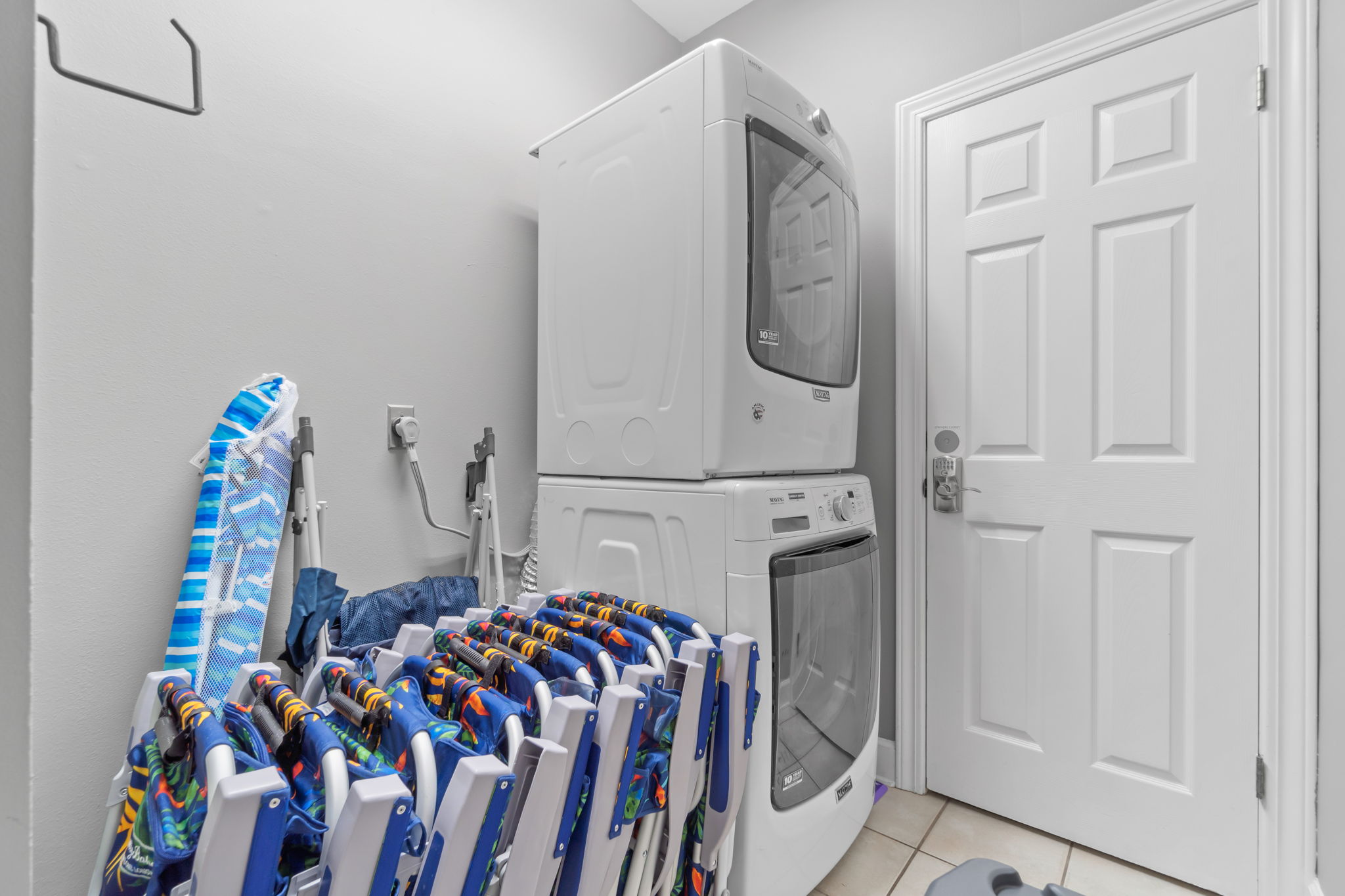 Laundry area. The beach gear is now behind the house in a bin.
