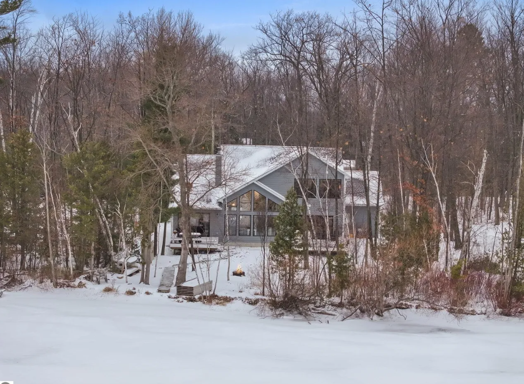 Enjoy the private back yard with dock, paddleboards and kayaks.