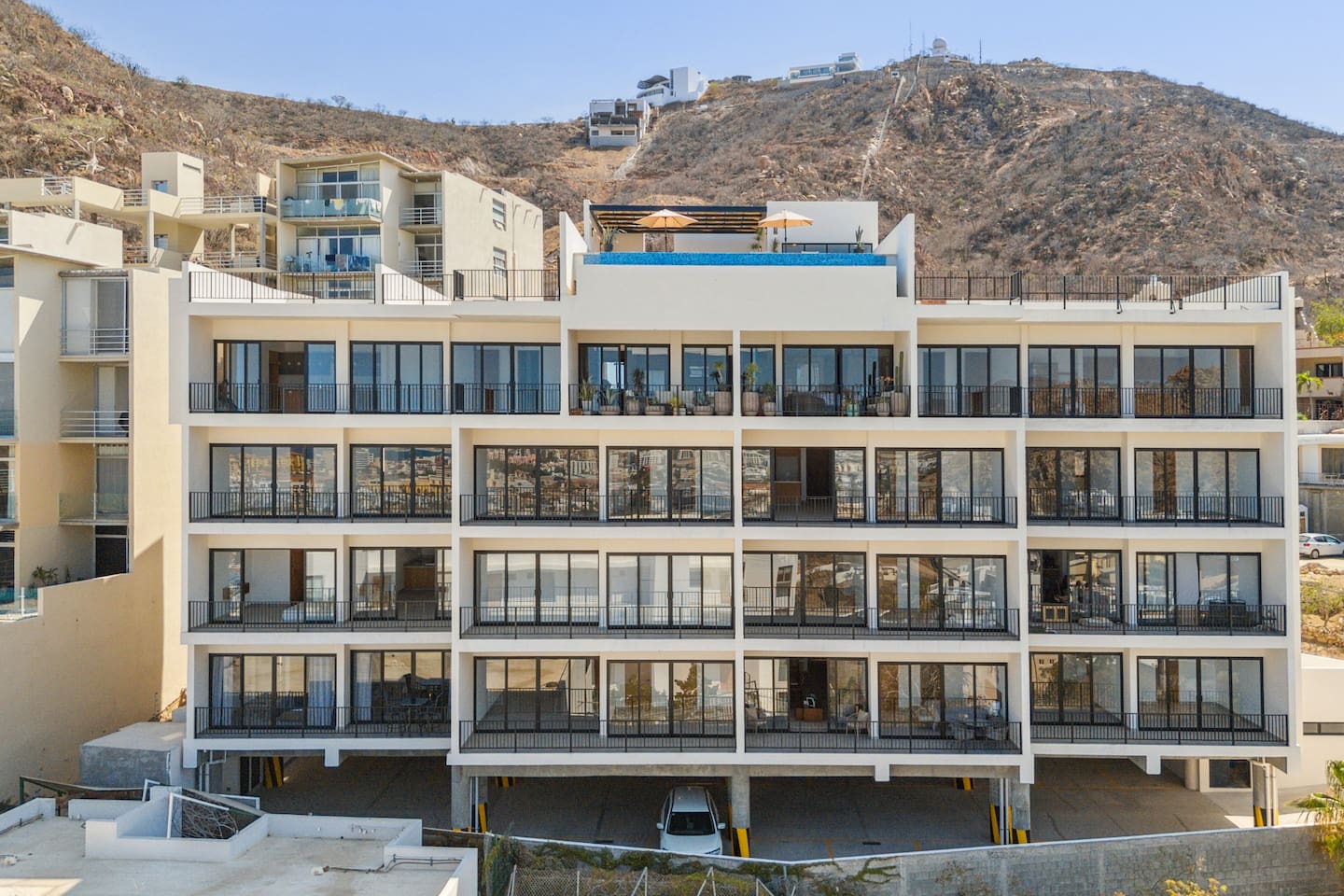 Behold the front view of Palma Blanca in all its stunning glory, showcasing its elegant architecture and inviting charm.