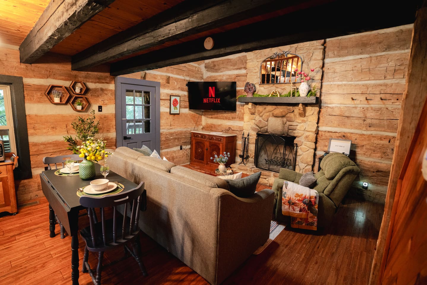 Gather with loved ones in the cozy living area and rustic dining nook.