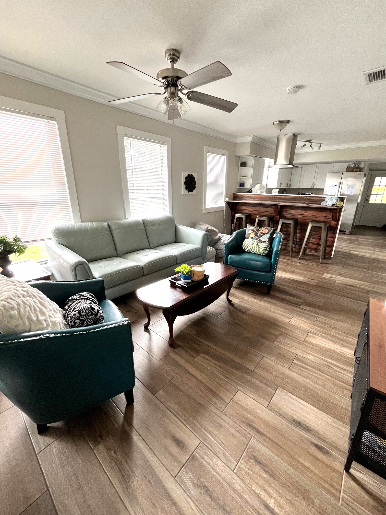 couch and club chairs