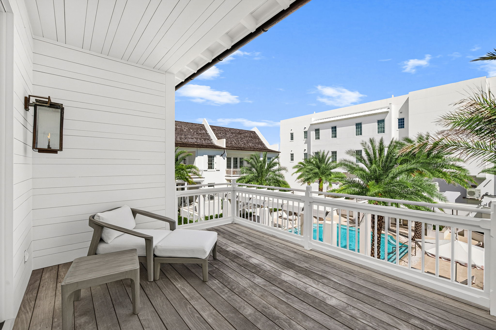 The perfect quiet spot to relax in the shade while enjoying stunning views of the pool.