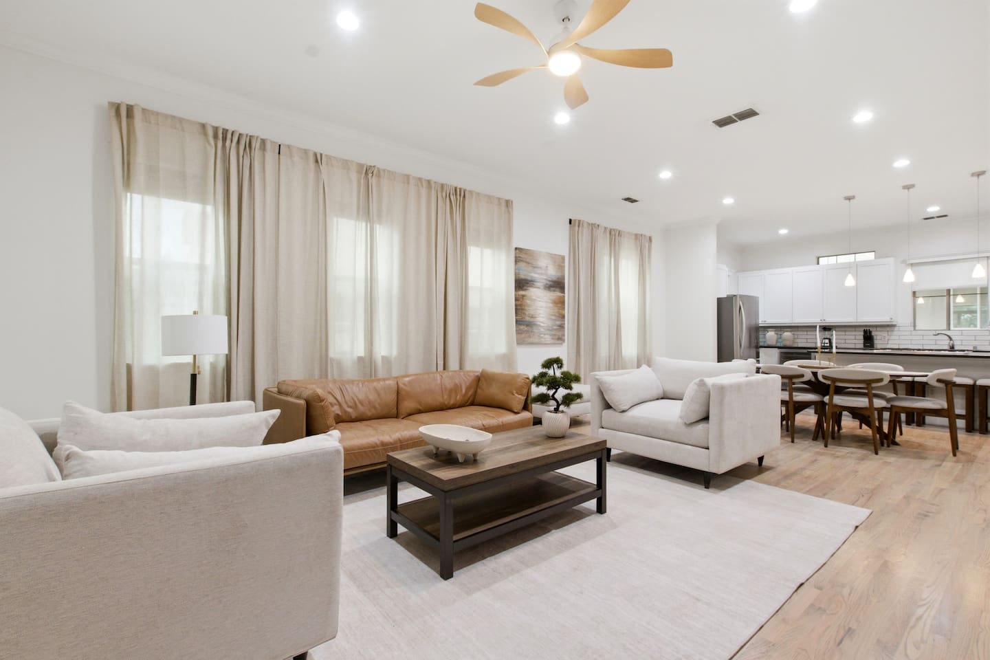 Living and dining areas flow together across an open, light-filled layout. Ideal for groups who want genuine shared space without everyone being on top of each other.
