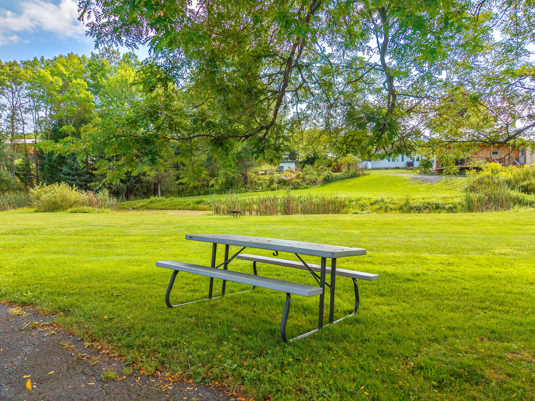 Take lunch outdoors at the picnic table overlooking the lawn.