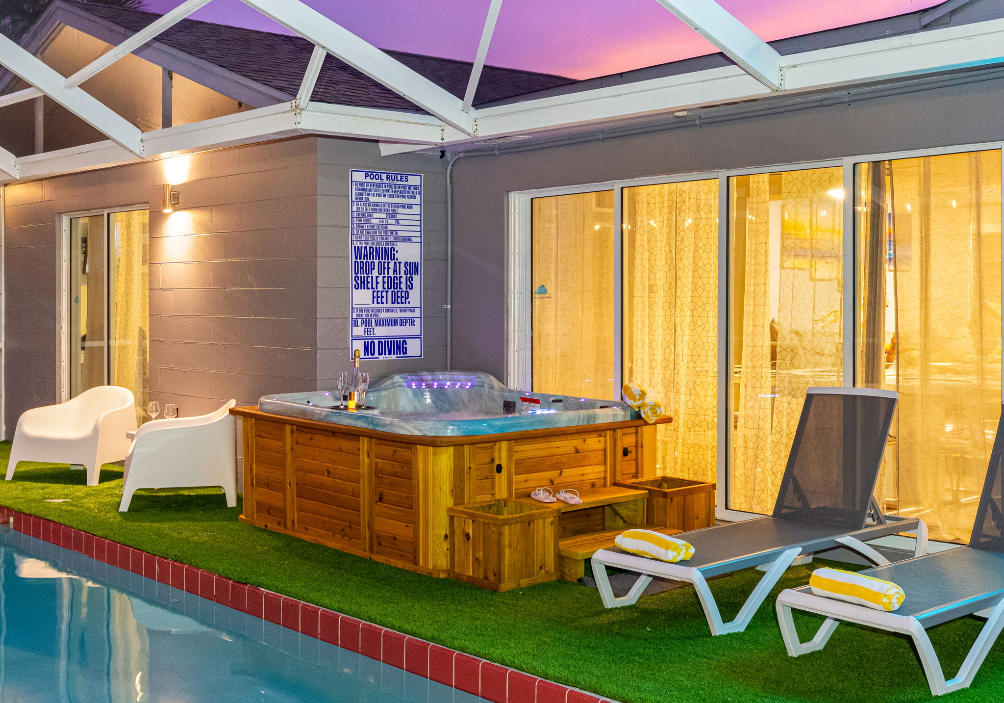 Settle into warm bubbling waters with a drink in hand, a view of the pool, and not a worry in sight.