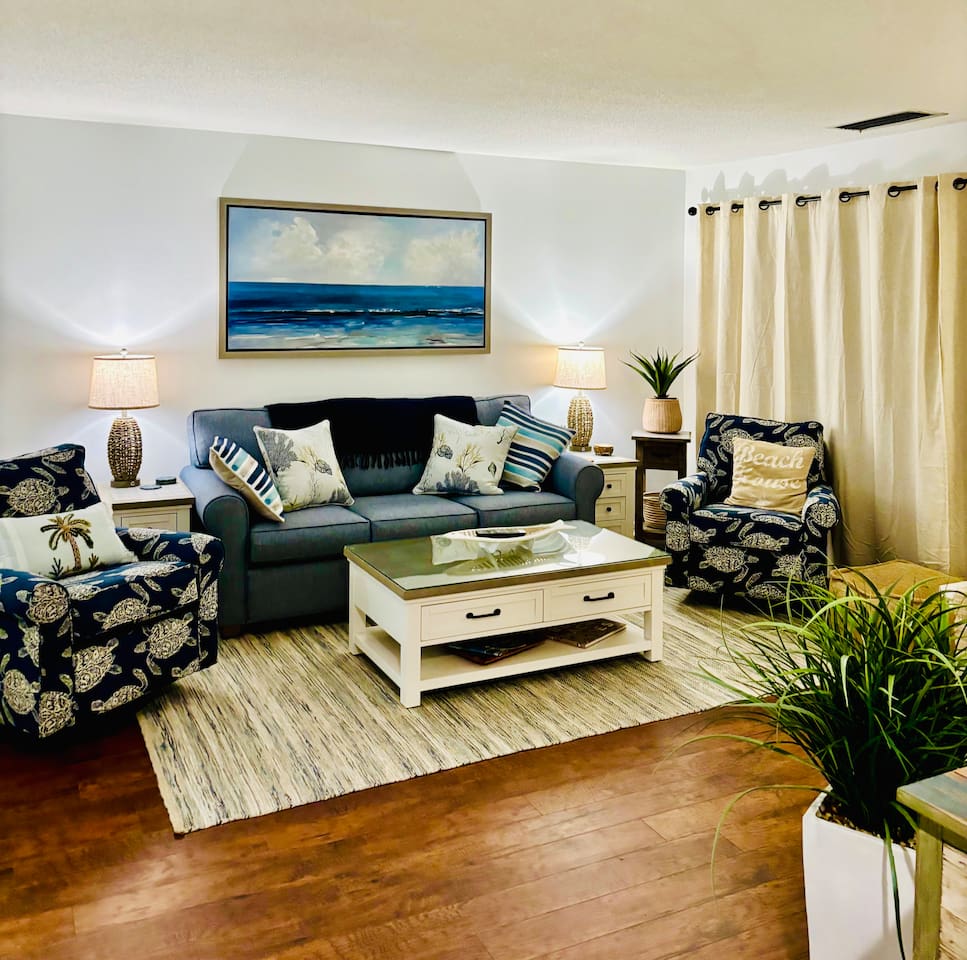 Living room with sofa and armchairs