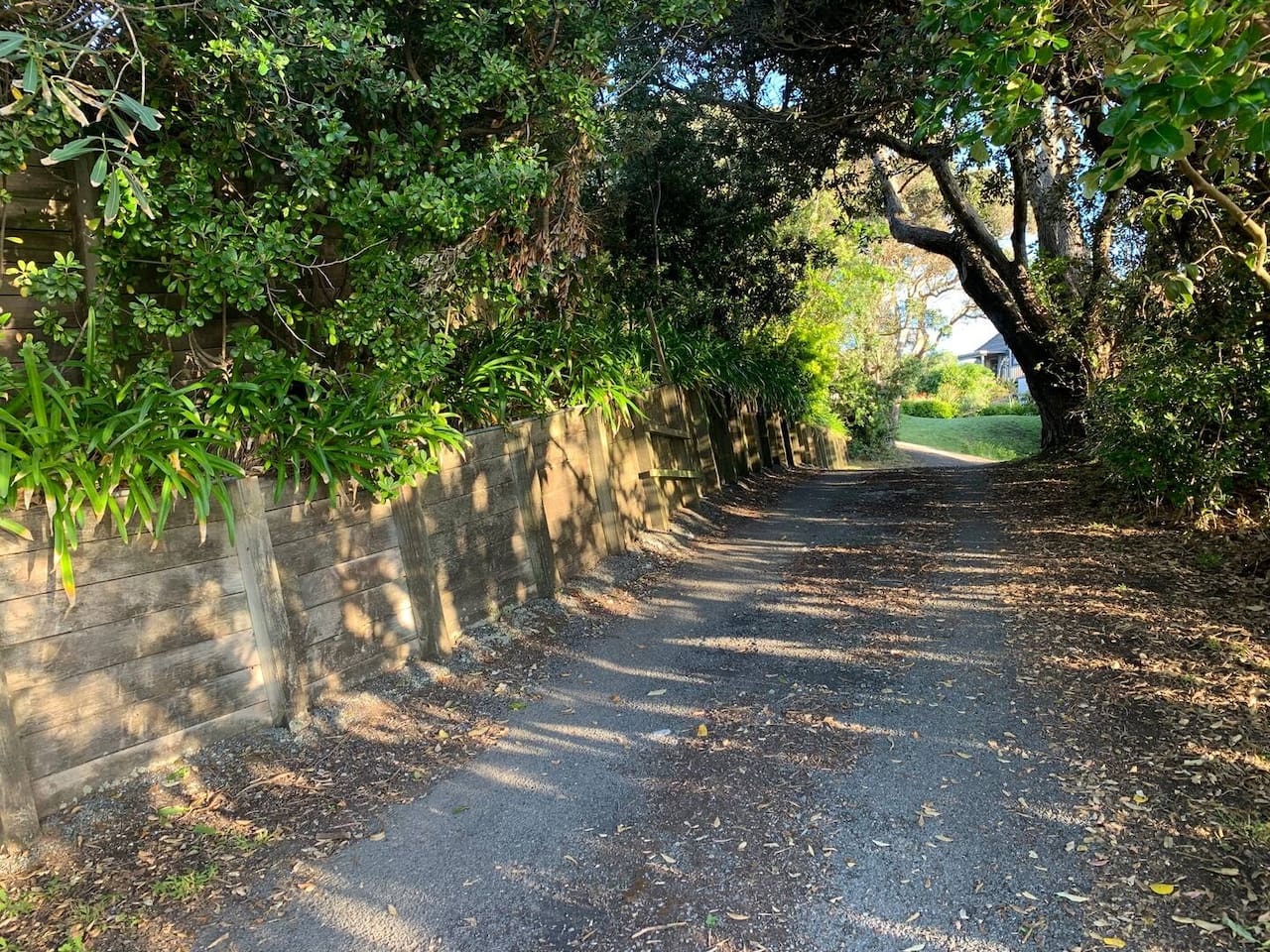 Wind your way up the tree-lined driveway to plenty of parking and turnaround at the Top 