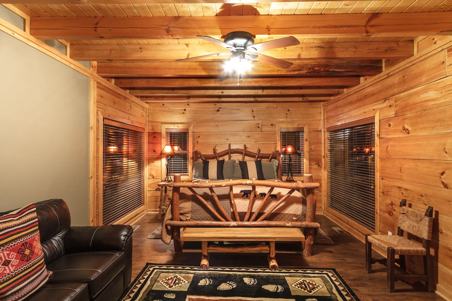 Master bedroom on main floor. This room has a king bed, queen sleeper, and electric fireplace.