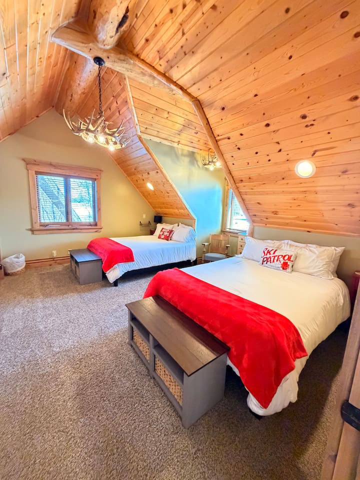 Elevated comfort, premium bedding and high-quality mattresses designed for a relaxing stay. Bedroom 4, on the 2nd floor, offers two queen beds and stunning Teton views from the window—making it a bright room that’s especially ideal for kids!