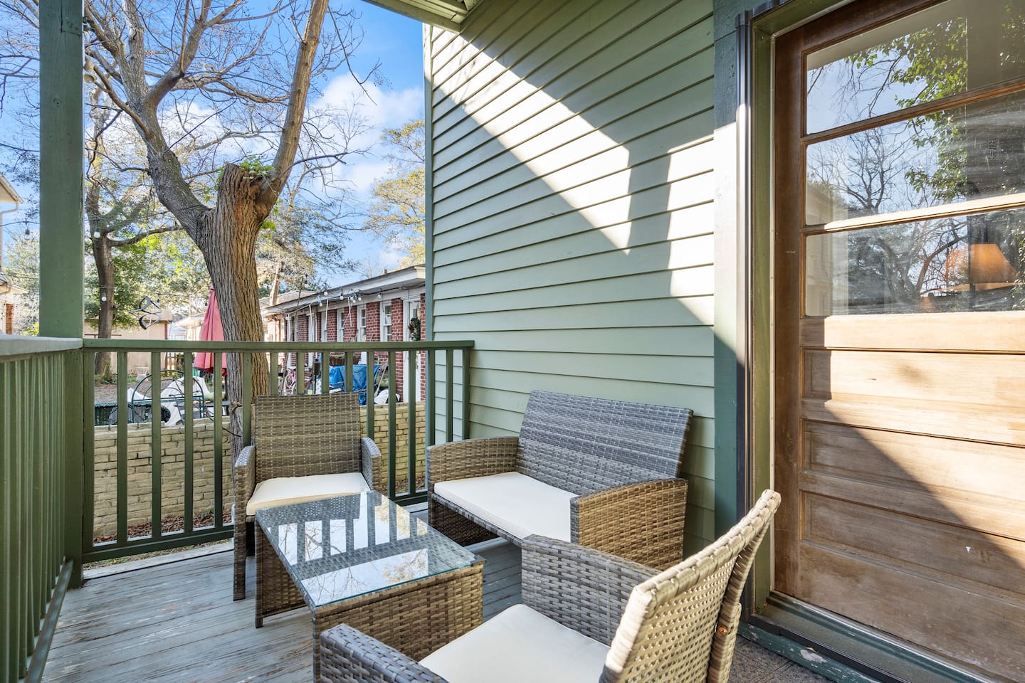 Your own front porch — sip your morning coffee and watch the Historic District wake up