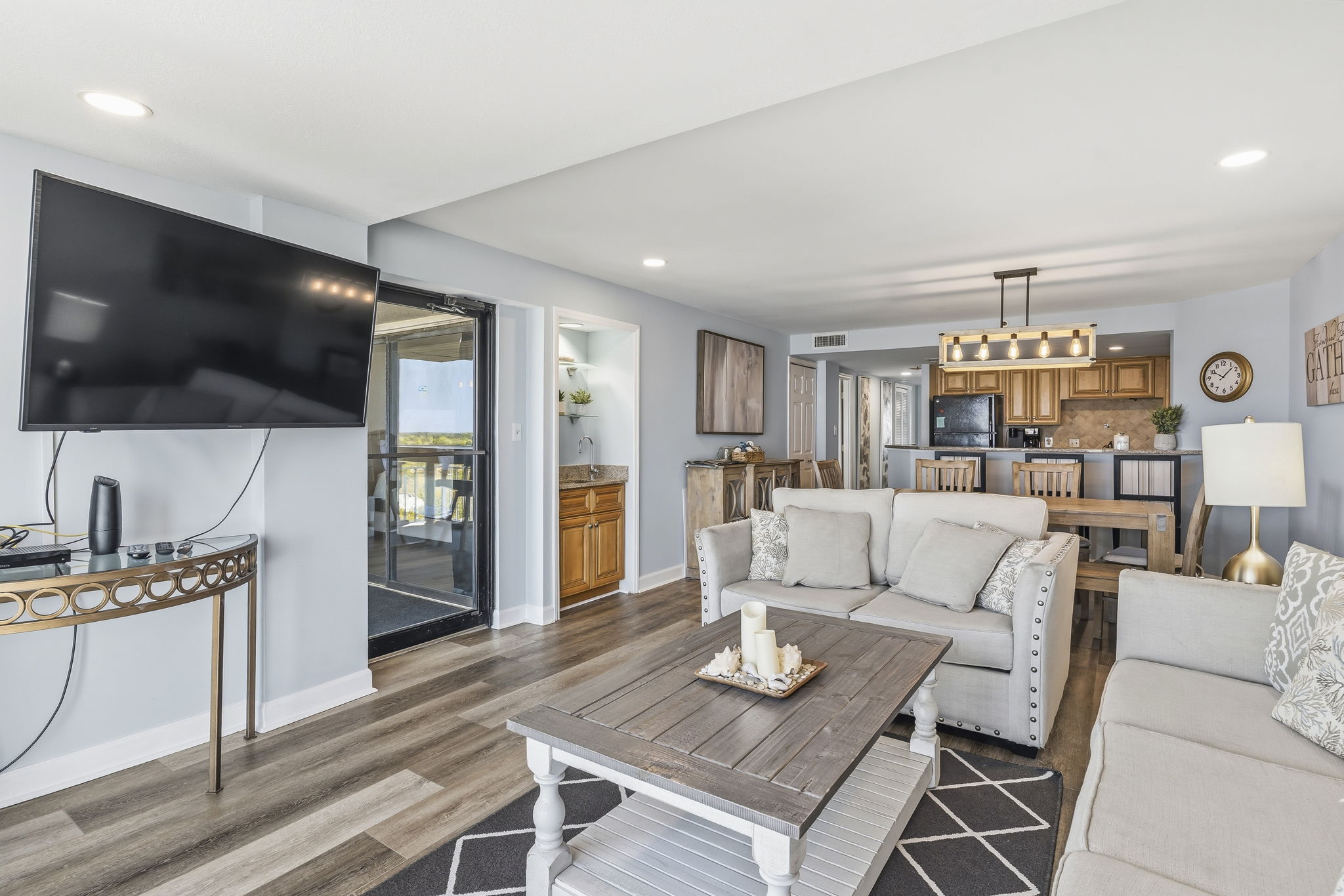 Open living area flowing into the dining area and kitchen