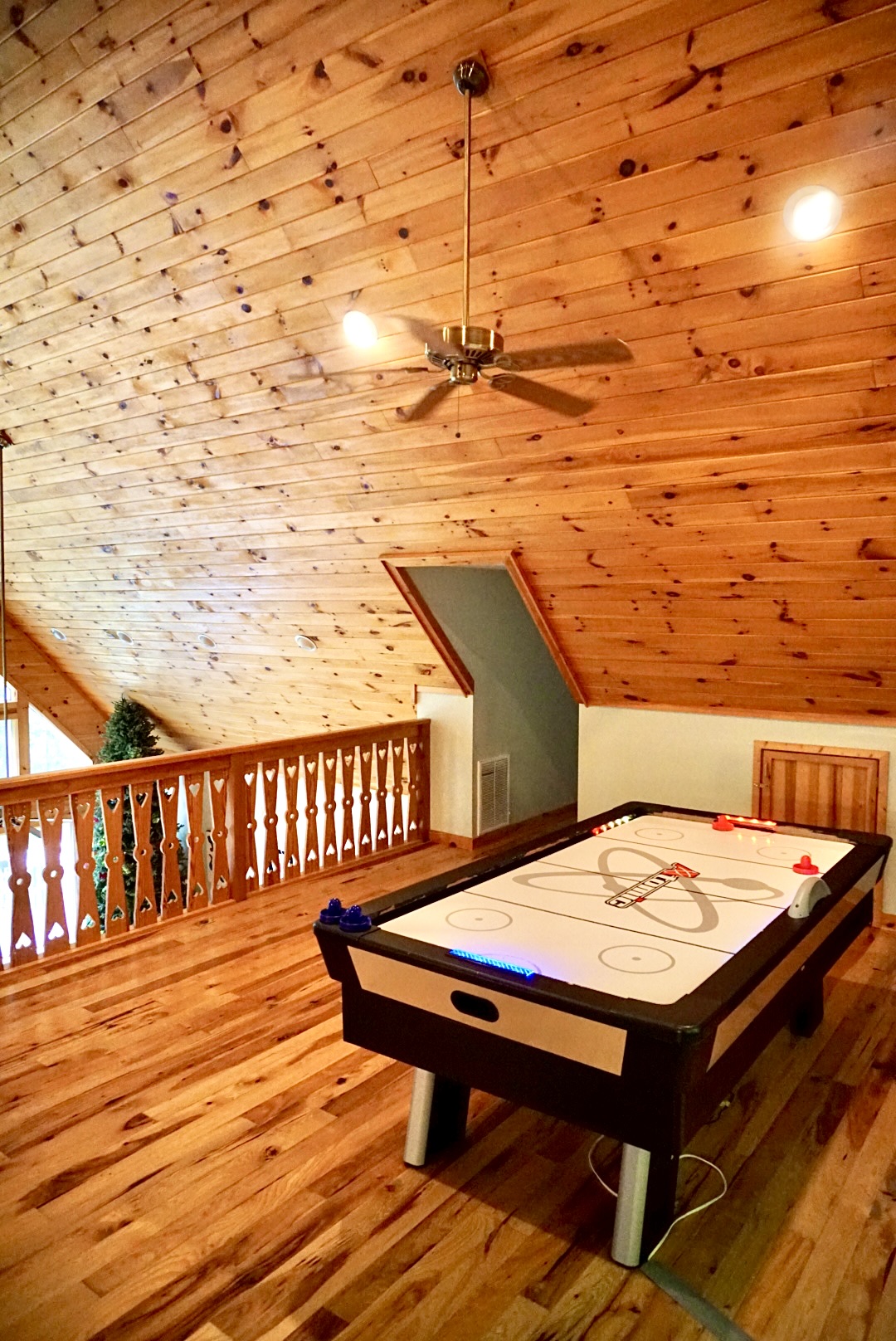 Discover endless fun with air hockey and vaulted wood ceilings in this spacious retreat!