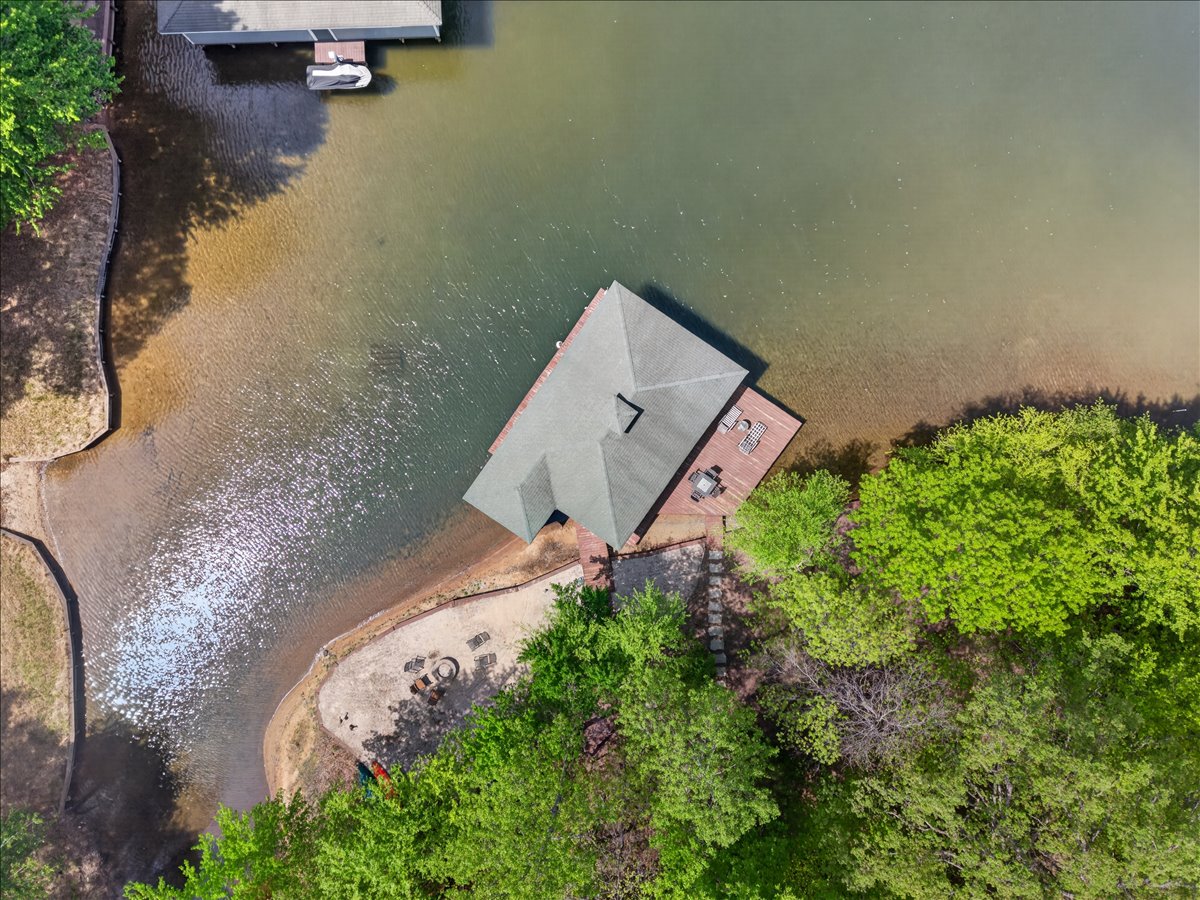Lake days made easy with your own dock and sandy shoreline.