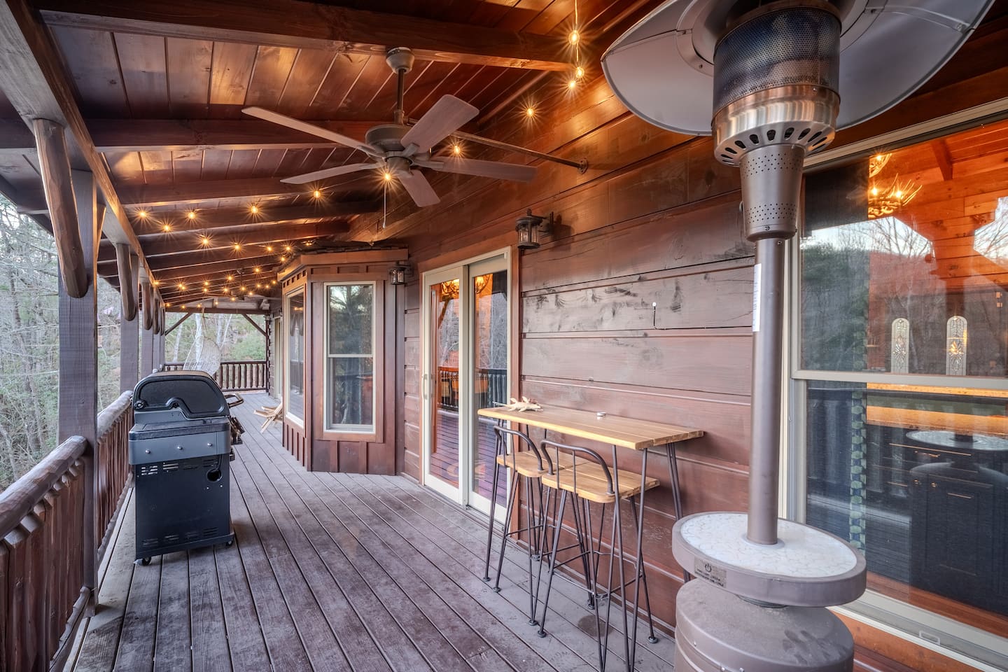 Wrap around porch with grills and seating