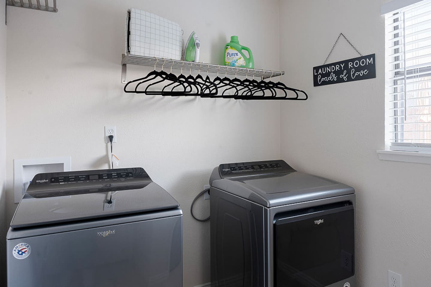 Delight in the complimentary laundry room for our guest, featuring a washer and dryer for your use during your stay