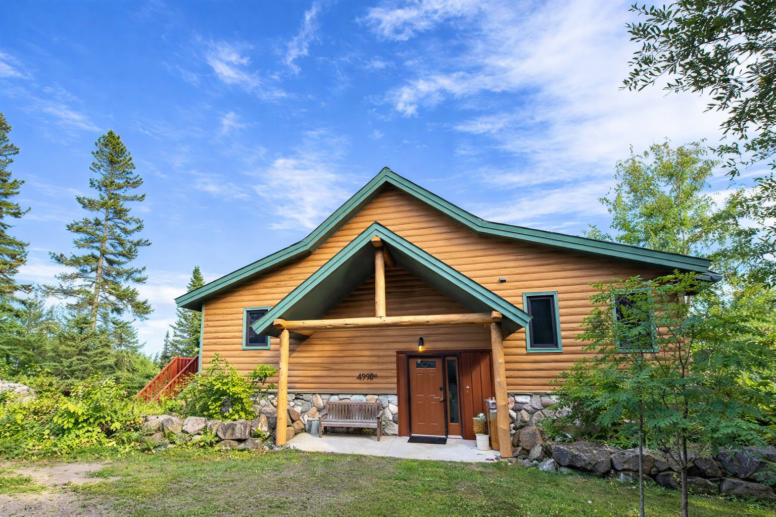 Front of the cabin welcomes you to your vacation. It is the perfect home base within 30 minutes of Grand Marais, Oberg Mt, Cascade State Park, Lutsen Mt and so much more!